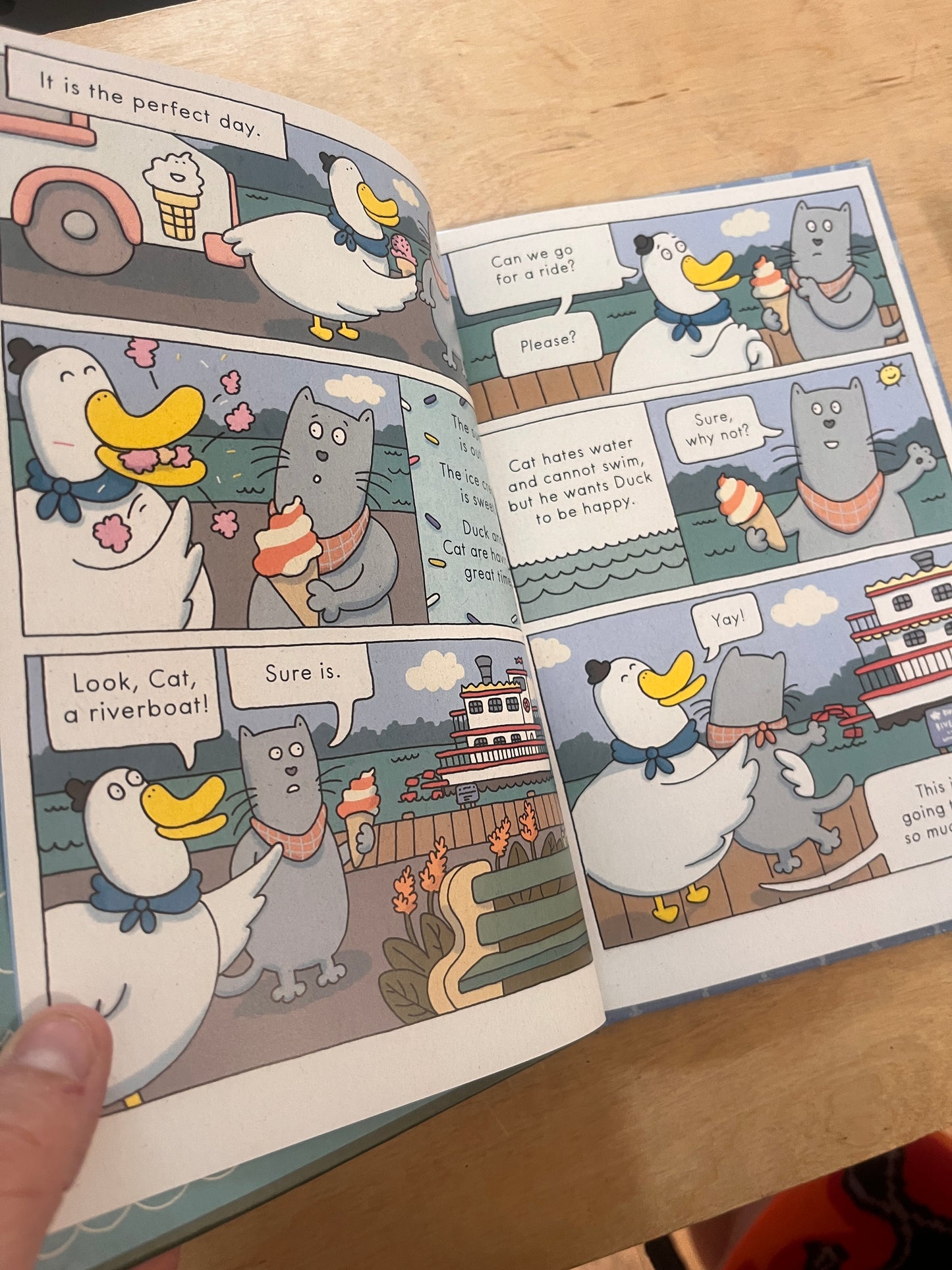 Duck and Cat Ride the Riverboat